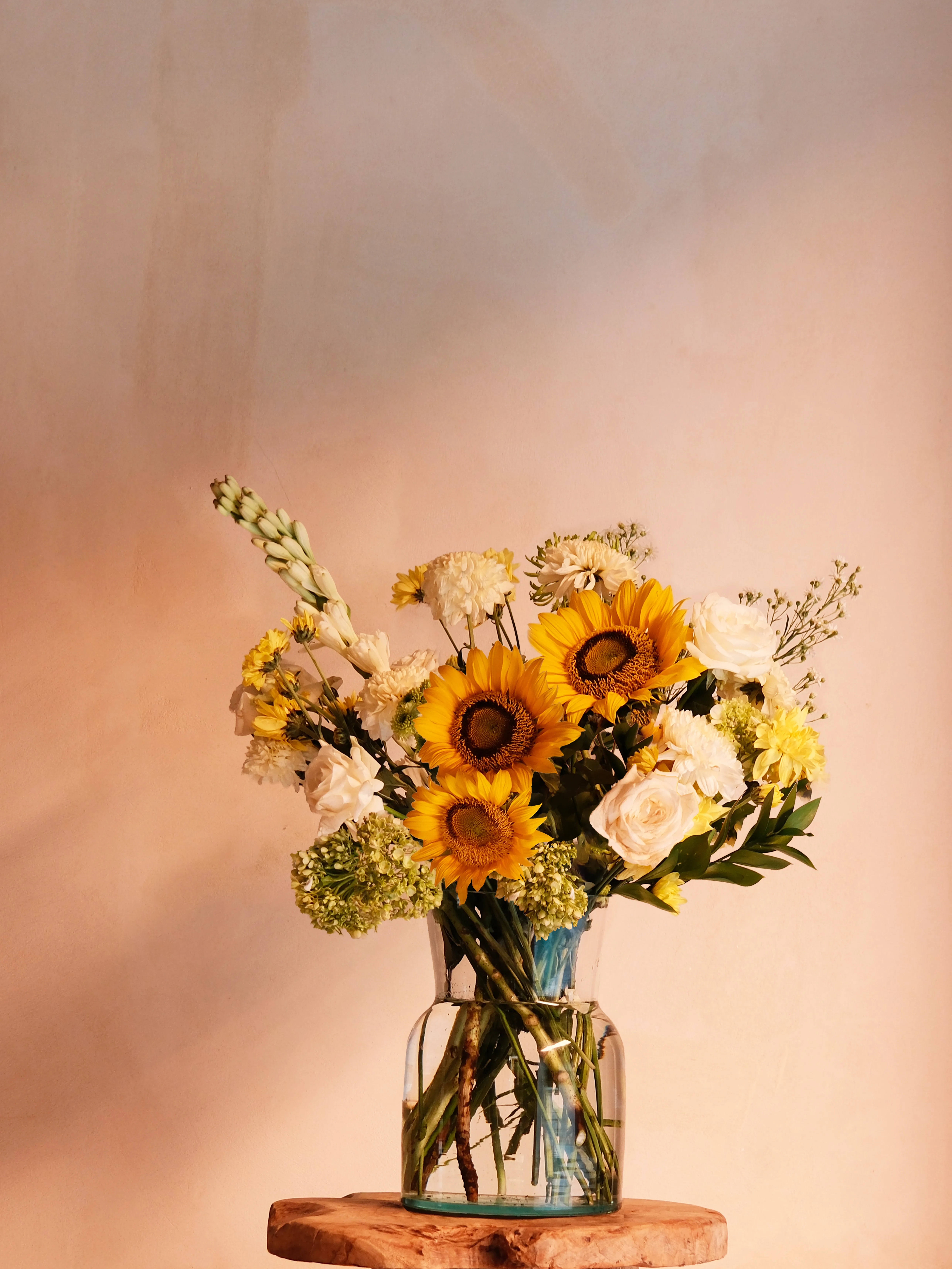 Grand yellow bouquet in a glass vase