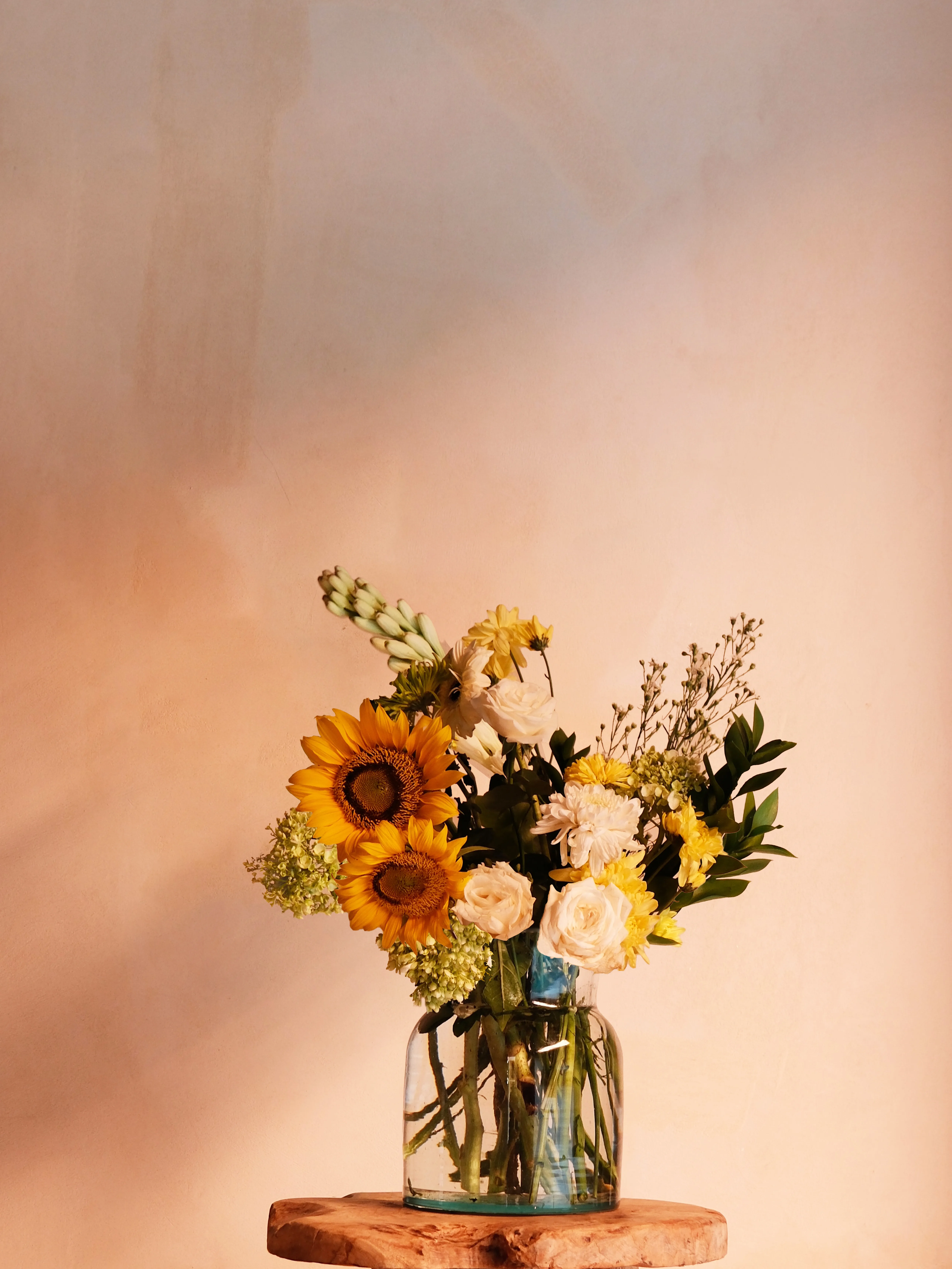 Signature yellow bouquet in a glass vase