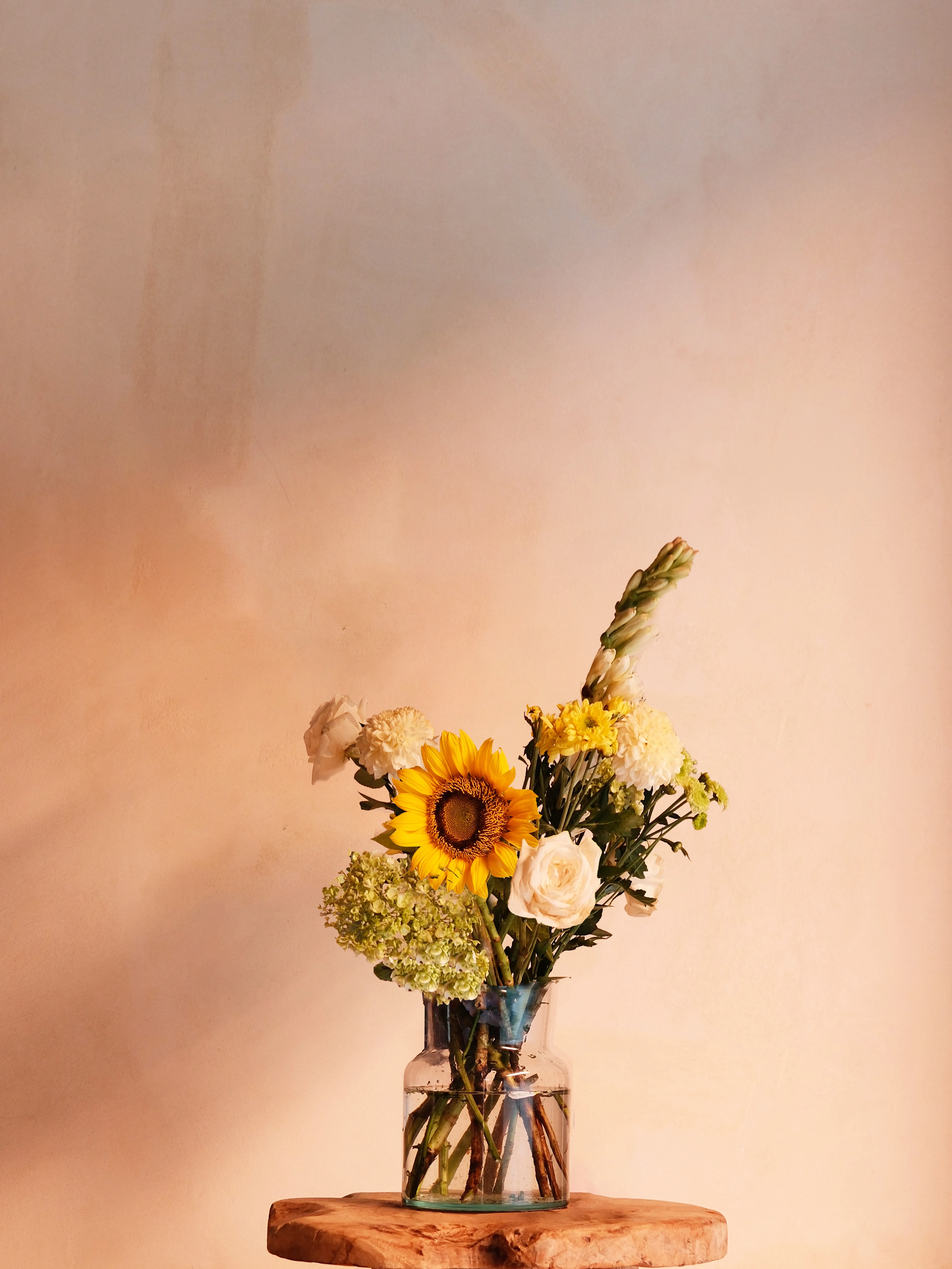 Petite yellow bouquet in a glass vase